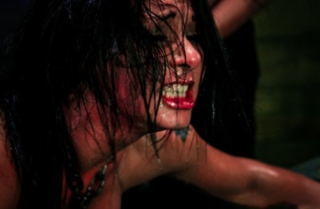 Petite brunette is fucked by strapon wielding dykes while in bondage 78338772