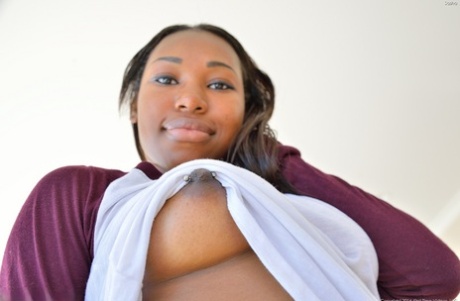 Smiley ebony doll fisting and toying her black holes in sexy school uniform 70110530