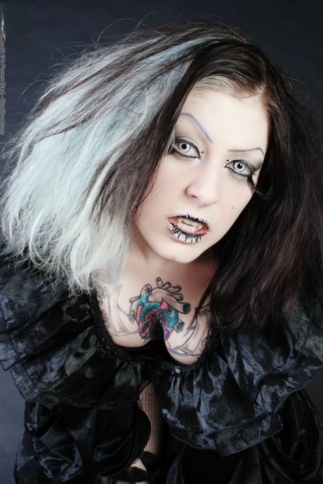 Goth girl Mad Sophie sports the Vampire look while exposing herself 77973804