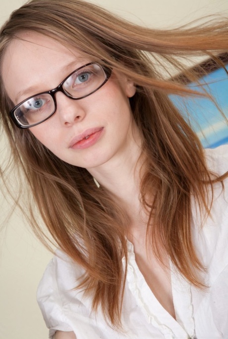 Nerdy secretary takes off upskirt panties before stripping naked at work 85209038