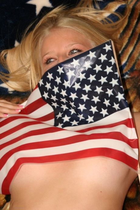 Blonde first timer Ziggy waives an American flag while posing in the nude 10837957