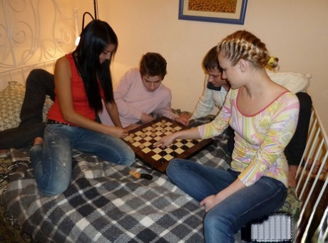 College students embark on group sex fucking after playing checkers on a bed 14438620