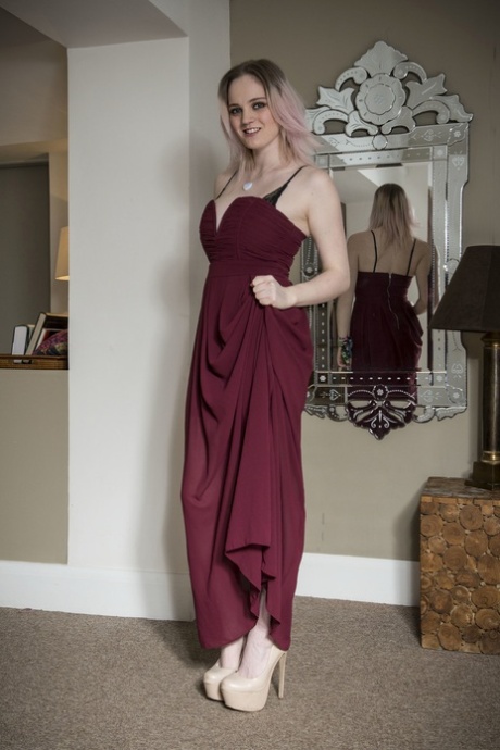 Pale chick Carly Rae shows her bare legs before freeing her tits from a onesie 91441776
