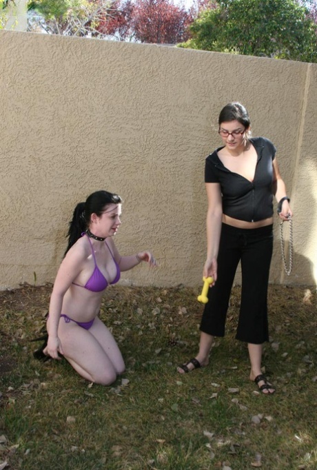 Dark-haired girl worships her lover's feet during non-nude lezdom play 28421458