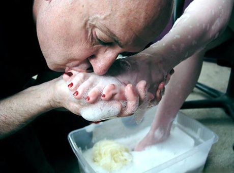 Dark-haired girl has her pretty feet washed and licked by an old man 18897693