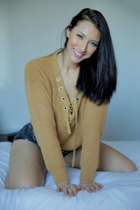 Beautiful brunette Bella Rolland touts her moneymaker while getting buck naked 57373077