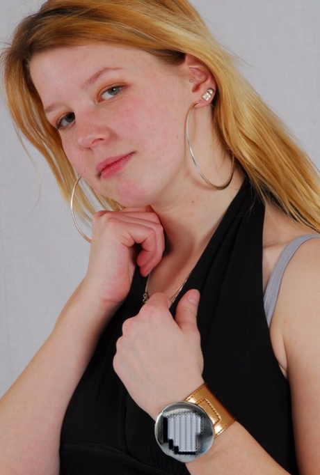 Pretty redhead Kylie shows off her Geneva cuff watch during non-nude action 20578949