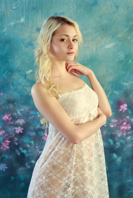 Sweet blonde teen Welesa Wil reveals her tight ass while disrobing 31396060