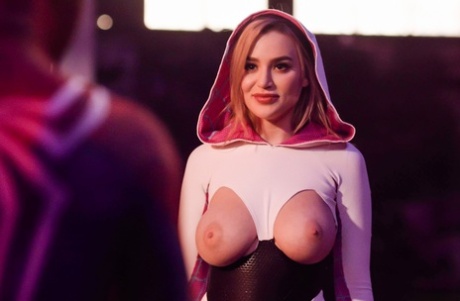 Blake Blossom takes a cumshot on her tits during sex with a superhero 15919526