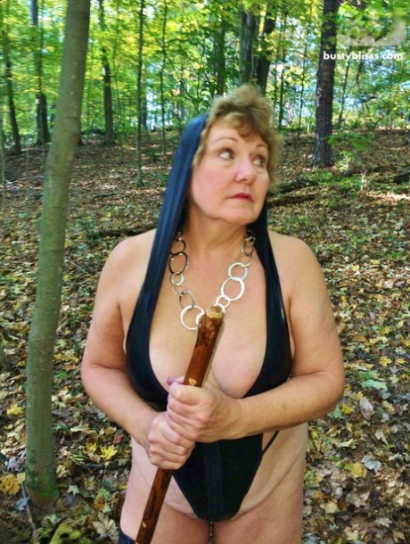 Mature woman Busty Bliss shows her natural tits outside her rural dwelling 80914046