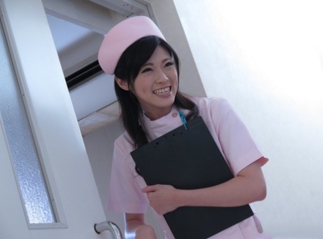 Cute Japanese nurse Sara Yurikawa gives a patient a handjob in her uniform 73266657