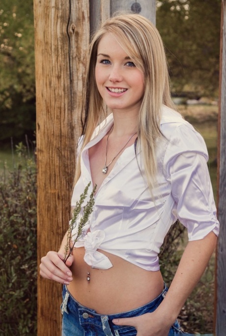 Blonde girl next-door type Jewel shows her tiny tits and thong while outside 59496143