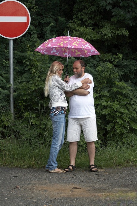 Sexy blonde teen dries off an old man caught in the rain and fucks him too 54556450