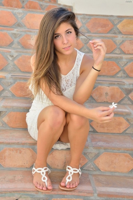 Young brunette cutie inserting massive dildo into tight vagina outdoors 33113350
