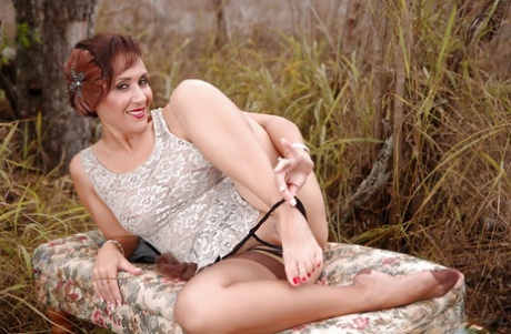 Roni gets horny in the woods and starts playing with her pussy 92484039