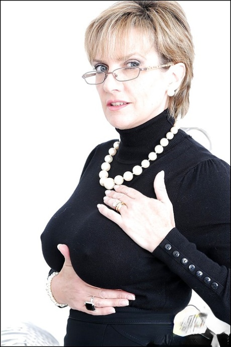 Clothed mature Lady Sonia shows her stunning big natural boobies 34533611