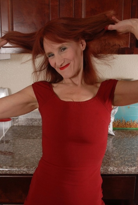 Redhead granny Debra is lying naked on the floor and masturbating 41961847
