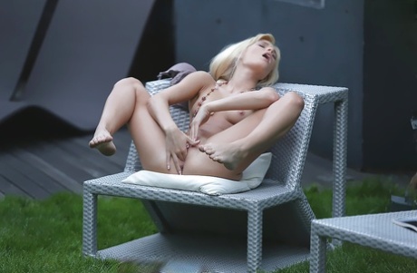 Close ups of beautiful blonde Candee Licious playing with erect nipples 41002697