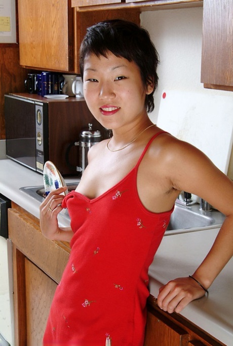 Petite Oriental first timer Vicky revealing nice perky tits and furry pits 90019987