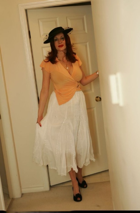 Mature babe Abigail Fraser posing with a strapon and gives a blowjob 90332633